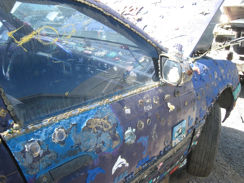 Illustration for article titled Groovalicious Purple Princess Of Peace Art Car Falls On Hard Times, Faces Crusher